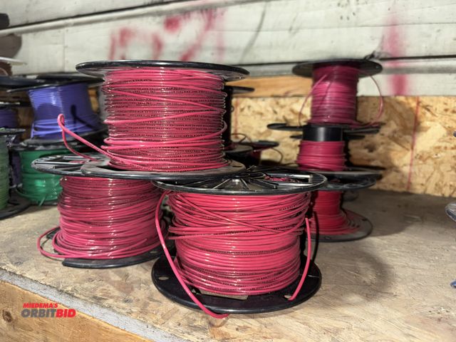 Lot 1-4512 - Lot of (9) partial spools of 16 gauge wire, red.