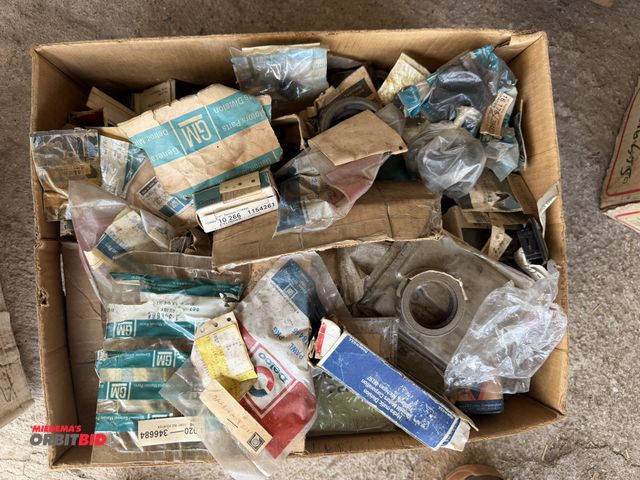 Lot 1-8559 - Lot of assorted GM NOS vintage car parts.