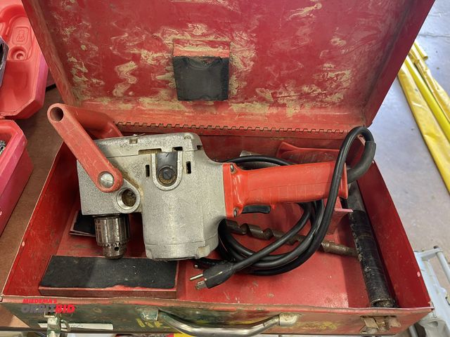 Lot 1-6124 - (1) Milwaukee heavy duty hole hog, Cat #6175-1, and case.