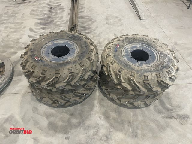 Lot 1-18786 - (1) set of Dirt Devil II X/T, 28X, 10.00-12, 6-ply rating, tires with 12" multi-lug pattern rims.