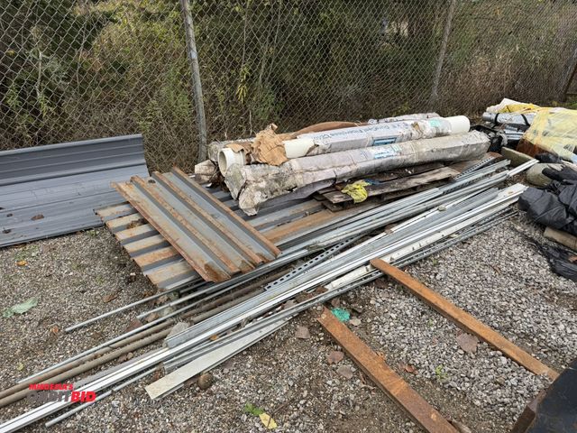 Lot 1-16039 - (2) pieces of approx. 12' long x 36" wide roofing steel, assorted Unistrut, and (4) 8" diameter x 8'...