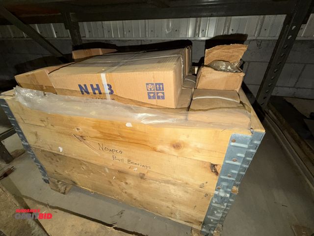 Lot 1-15869 - (1) 32" width x 17" height x 23" depth wood crate full of new ball bearings.