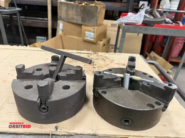Lot 1-1999 - Lot including (1) 8.5" diameter 3-jaw chuck, and (1) 8" diameter 4-jaw chuck.