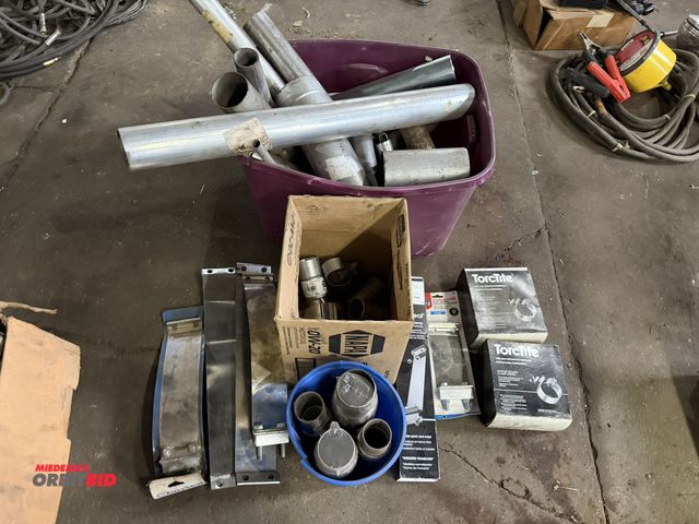 Lot 1-1172 - Lot of assorted exhaust related items, includes (2) new Torch Tight exhaust sealing clamp systems, v...