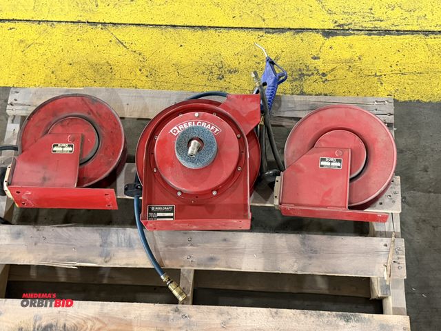 Lot 1-5272 - Lot including (2) Duro, model 2003, retractable air hose reels, and (1) Reelcraft, model 4435-OLP, r...