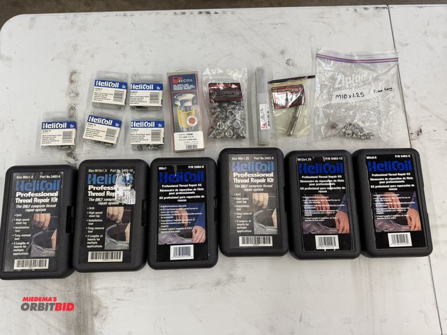 Lot 1-6159 - Large lot of assorted HeliCoil thread repair kits, and accessories.