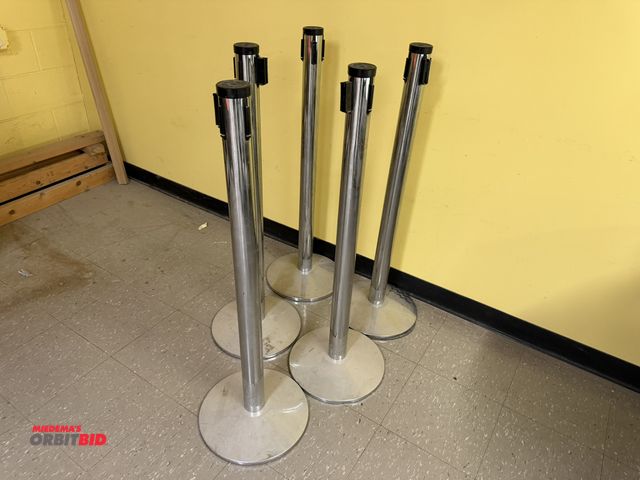 Lot 1-16779 - Lot of (5) Visiontron Corporation retracta-belt retractable stanchions with weighted bases.