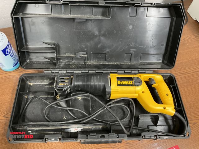 Lot 1-12002 - Dewalt  DW303M  Electric Powered Single Phase Reciprocating saw 0-2400 SPM, with case.