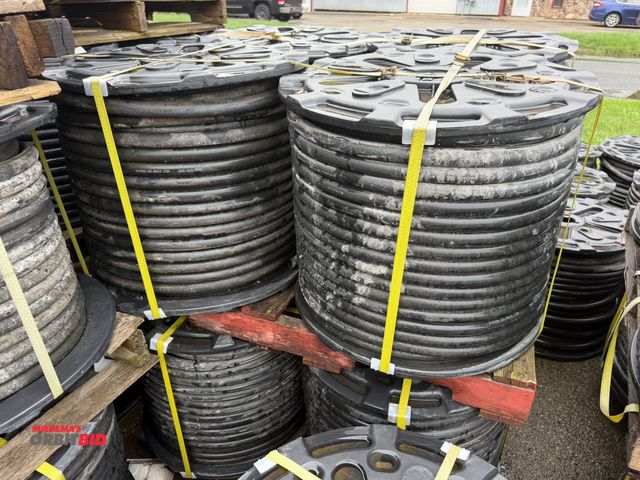 Lot 1-18736 - Lot of (8) spools of 1" heavy duty rubber hose, 1" OD with 1/4" wall, approx. 5/8" center diameter, ...