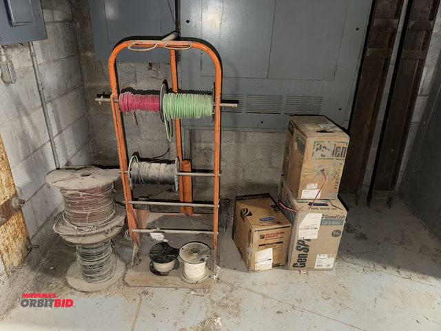 Lot 1-16719 - (1) electrical spool rack, includes (3) partial spools of #10 THHN, #14, new box of Cat 6 riser cabl...