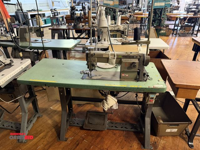 Lot 1-4657 - (1) Mitsubishi, model LS2-180, commercial sewing machine with power table, Mitsubishi 2-pole, 220V e...