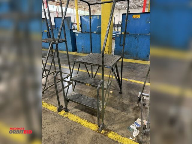 Lot 1-5190 - (1) Gillis 3-step warehouse safety ladder with front mounted wheels.