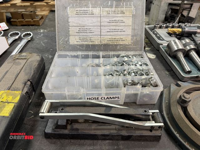 Lot 1-15568 - Lot of assorted hose clamps with crimping tool.