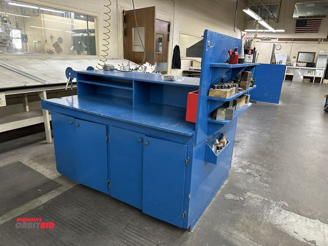 Lot 1-17736 - Contents only (work bench not included), includes various letter and number punches, lithium grease,...