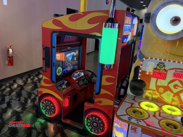 Lot 1-11242 - (1) Super Big Rig kid's arcade style semi truck driving game, in working condition, winning bidder r...