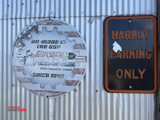Lot 1-8236 - (1) 20" diameter Jasper Engines and Transmissions tin sign, and (1) 12" x 18" Harley Davidson "Parki...
