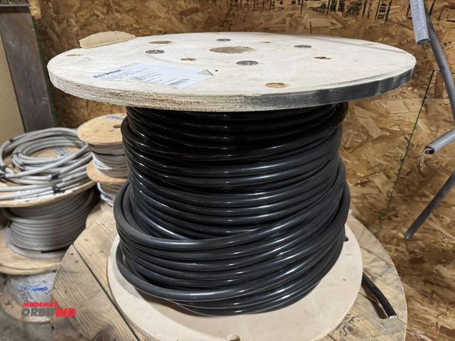 Lot 1-4303 - (1) partial spool of 1/0 AWG, #2, aluminum wire, 23.5" x 19" tall.