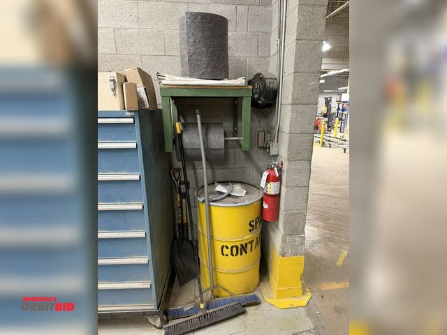 Lot 1-17083 - (1) wall mount spool rack with (2) partial rolls of oil absorbent pads, includes Hubbell cord reel, ...