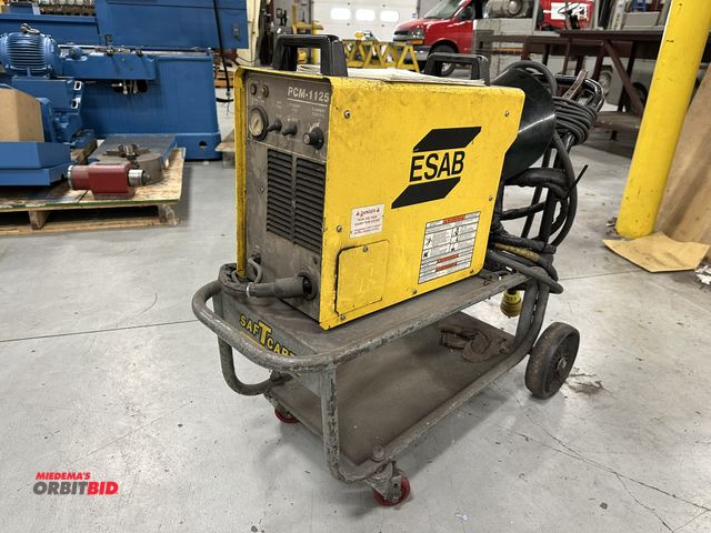 Lot 1-19174 - (1) ESAB, model PCM-1125, plasma arc cutting machine with SafTcart and manual, and green tented full...