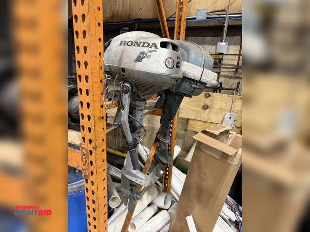 Lot 1-18667 - (1) Honda 4-stroke outboard motor, model BF20, 2 HP, engine pulls through and has compression.