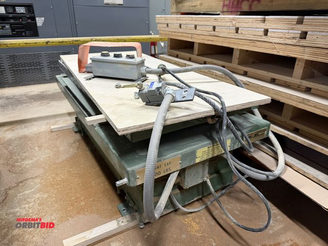 Lot 1-16740 - (1) American Compact Lift, model 1070, 2000 lb. capacity lift table with foot control and a 48" x 24...