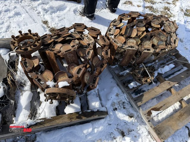 Lot 1-11603 - (1) set of Loegering skid steer tracks, tracks are approx. 9.5" wide, unknown length.