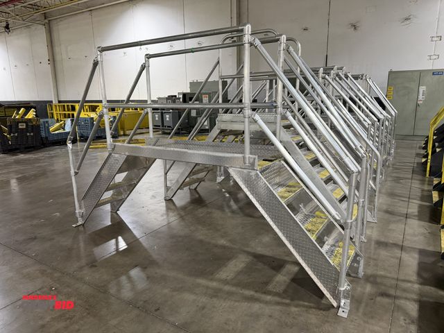 Lot 1-5479 - (1) 130" long, stainless steel 4-step, 2-sided platform, platform floor at 39", guardrail at approx....