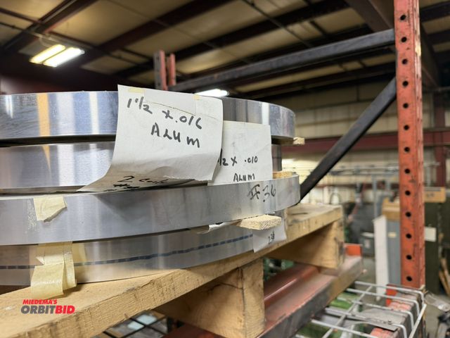 Lot 1-18694 - Lot of 4 assorted coils of aluminum, includes (2) 1.5" x .016", (1) 1.5" x .01", and (1) 1.5" x .007...