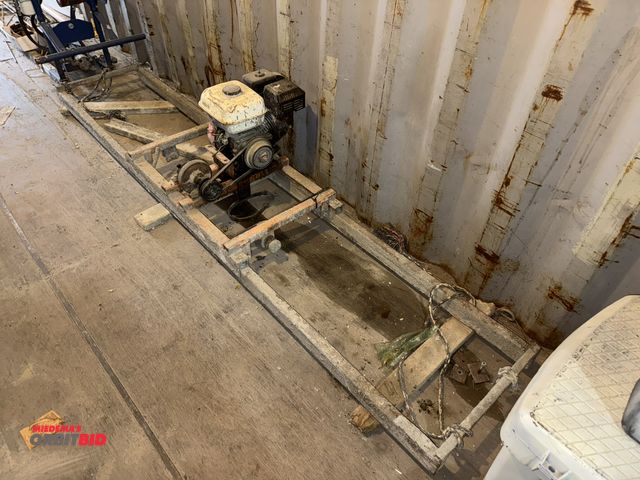 Lot 1-18490 - (1) gas powered 9' concrete screed deck, Honda gas engine, and extra screed deck attachment, approx....