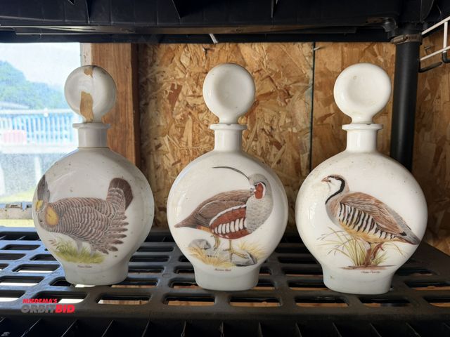 Lot 1-8326 - Lot of (3) collectible whiskey bottles.