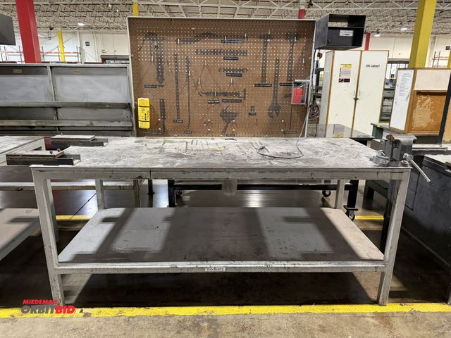 Lot 1-5218 - (1) custom built 84.5" length x 37" height x 36" depth heavy duty steel work bench with lower shelf,...
