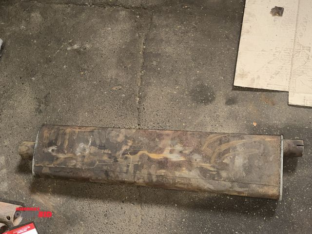 Lot 1-1254 - (1) muffler for a vintage Plymouth vehicle, year and model unknown.