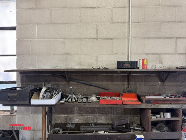 Lot 1-18527 - Lot of assorted pulley puller items, parts, washers, nuts, thread rod, and more.