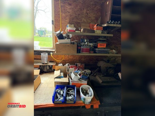 Lot 1-12336 - Large lot of assorted automotive items, includes gauges, oil filters, fuel filters, honing tool, vin...