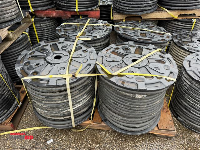 Lot 1-18733 - Lot of (4) spools of 1" heavy duty rubber hose, 1" OD with 1/4" wall, approx. 5/8" center diameter, ...