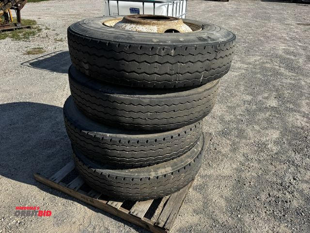 Lot 1-6928 - Lot of (4) assorted, used semi-tractor tires, 11R24.5, mounted on rims.