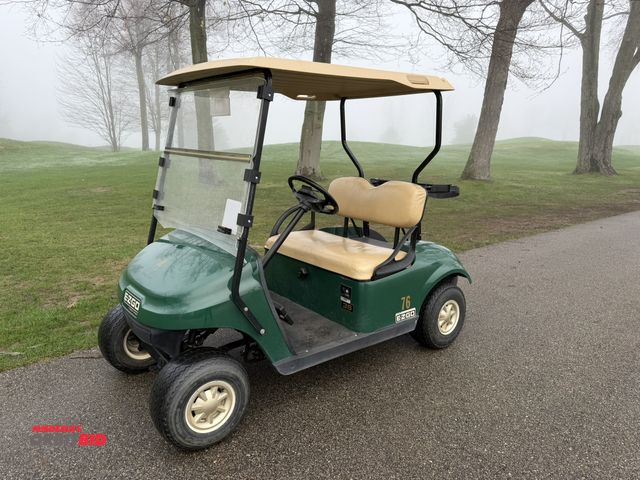 Lot 1-19375 - (1) 2014 E-Z-Go golf cart with a Kawasaki gas engine, includes canopy, ball carrier, fold-down winds...