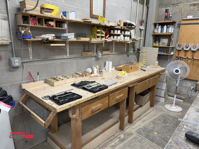 Lot 1-16634 - (1) custom built 4-drawer wood work bench, 116.5" length x 31" depth x 36 3/4" height, includes uppe...