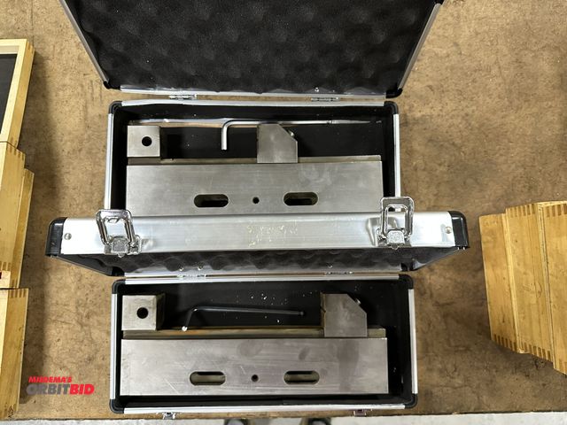 Lot 1-19500 - Lot of (2) approx. 1 3/8" x 8" capacity precision machined vises with metal cases.