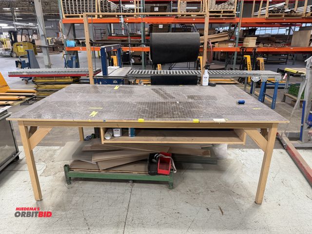 Lot 1-17334 - (1) 96" width x 37" height x 60" depth wood layout table with lower shelf and contents, including (1...