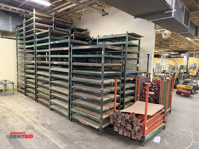 Lot 1-16738 - Lot of approx. (120) stackable steel racks, 36" width x 9" height x 48" depth, with (1) rack of (40)...