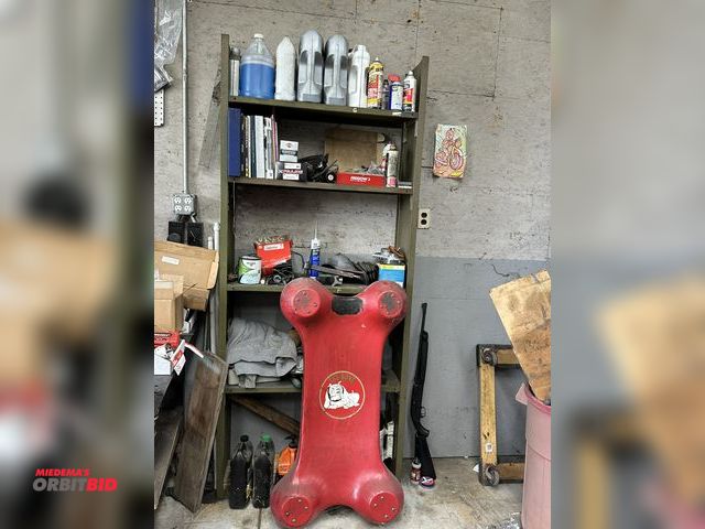 Lot 1-525 - Shelf with contents, 37.5" x 12" x 87" tall includes The Bone Creeper, Harley Davidson Motorcycle he...