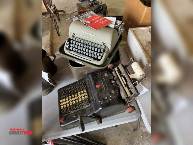 Lot 1-12313 - Lot of (2) vintage typewriters (1 is a Remington Quiet-Riter, and Allen Wales Corp. vintage cash mac...