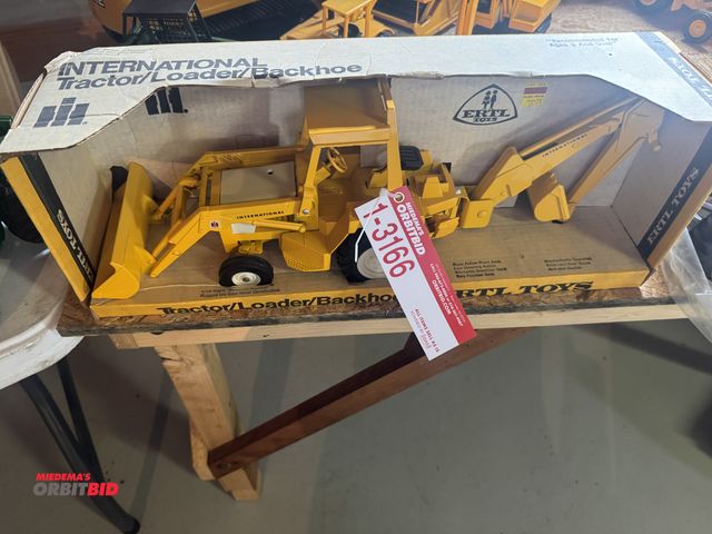 Lot 1-3166 - (1) International loader backhoe, International 5288, case 600 and (2) smaller die cast tractors