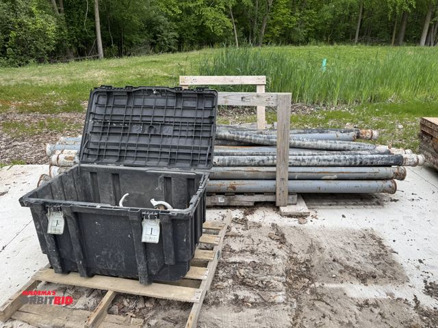 Lot 1-18718 - Lot of (23) 10' long cement pumping pipes, (19) 10' steel pipes with OD of 5", assorted pipe clamps,...
