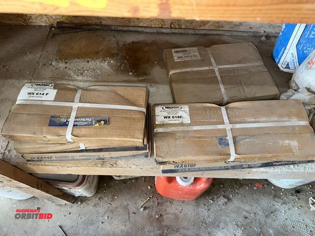 Lot 1-14192 - Lot of new various power trowel blades, includes (1) set of 4 Wagman, model WX1014F0, (3) sets of 4 ...
