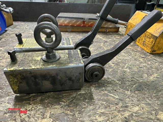 Lot 1-19199 - Lot of (2) Mag-Mate heavy duty lift magnets with roller cam release and attached eye bolts.