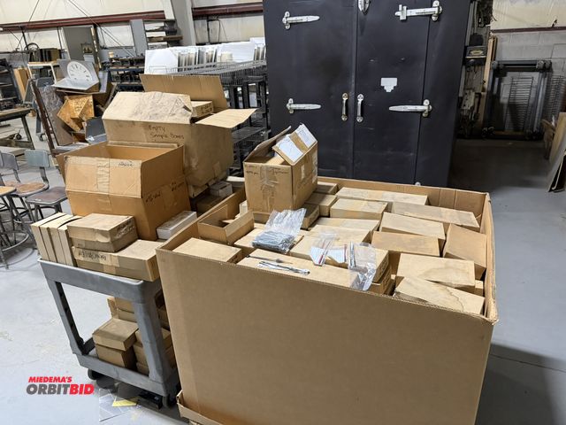 Lot 1-18954 - Large lot of assorted Howard Miller clock hands, steel and aluminum, and customer movement parts (1 ...