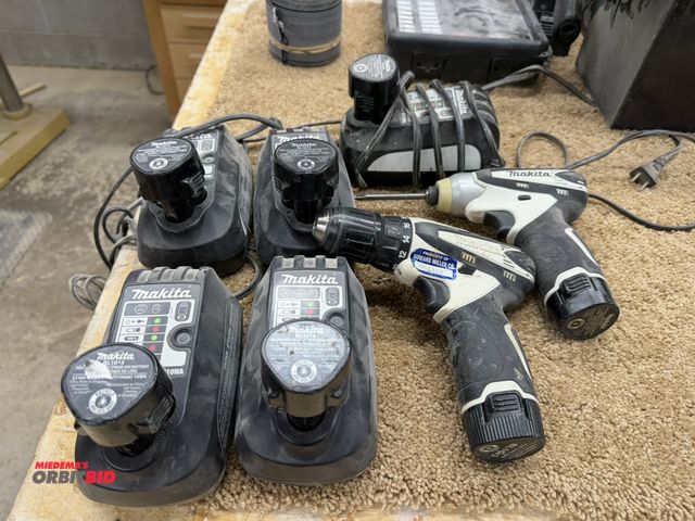 Lot 1-16598 - (2) Makita cordless drills, includes TD900 impact, 3/8", (7) batteries, and (5) chargers.