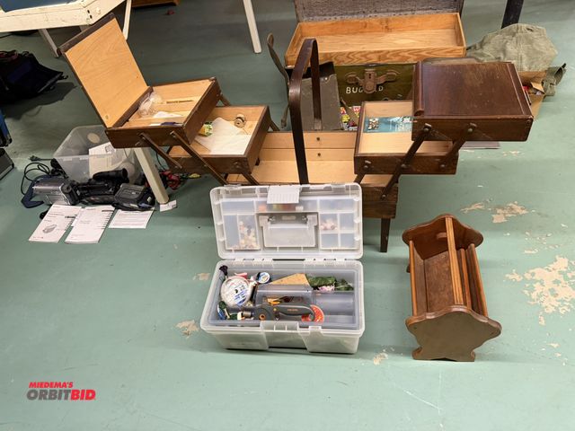Lot 1-12182 - (1) portable, accordion style wood sewing cabinet, mini-magazine rack, and assorted sewing items.